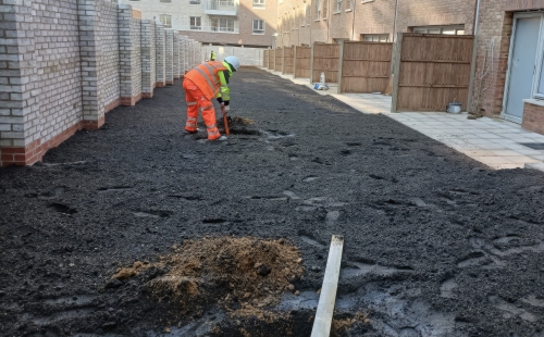 Worker engaging in cover systems verification